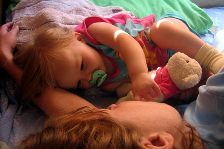 Mommy and baby gently wake up from a nice nap